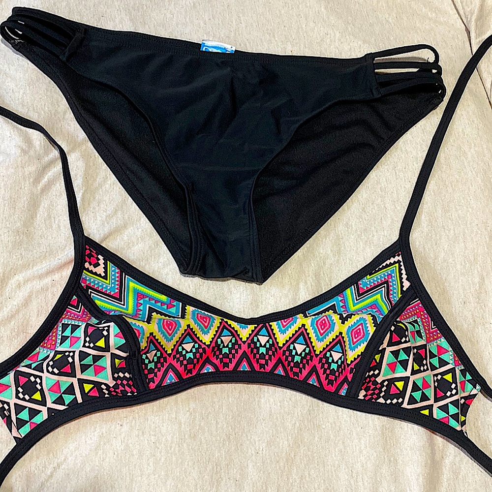 worn a couple times, cute swim suit!!!